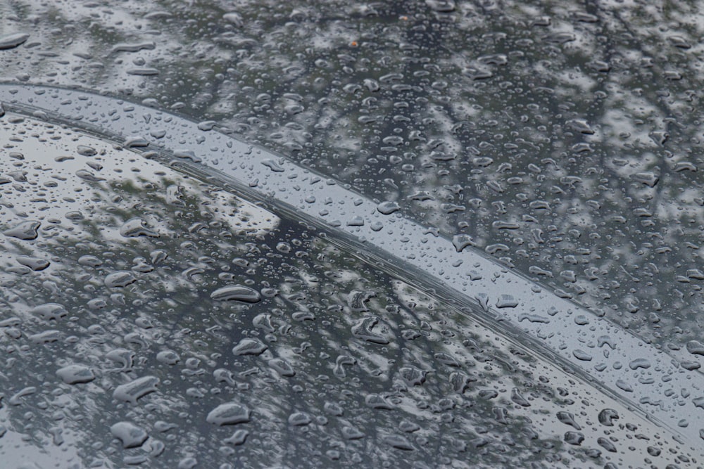 rain drops on the windshield of a car