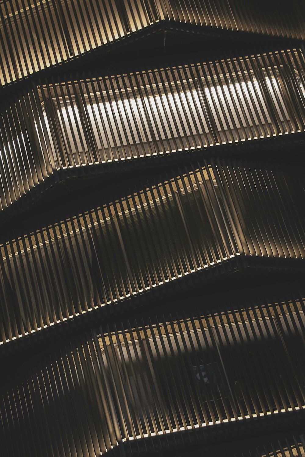 a close up of a building made of metal bars