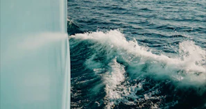 Waves splashing against the hull during an adventurous day at sea