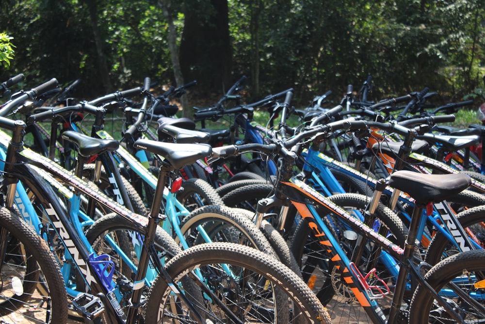 a bunch of bikes that are parked together