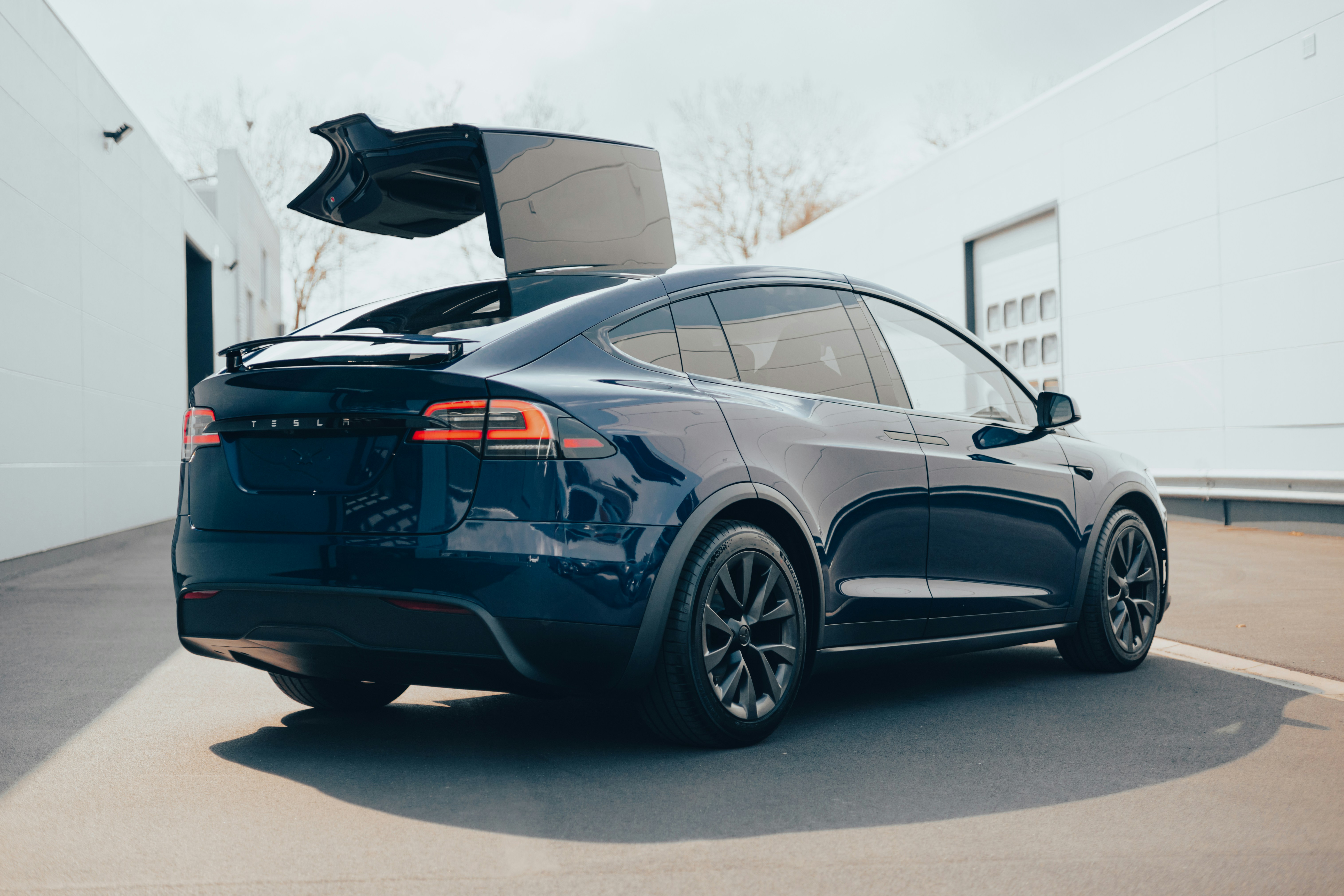 Bottom view of an electric car showing the large underbody battery pack