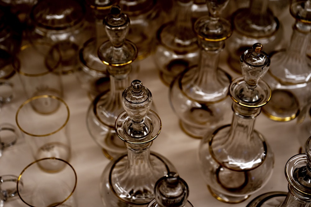 a table topped with lots of empty wine glasses