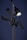 Several security cameras are mounted on a tall pole, with a bright light fixture attached nearby. The background is a dark evening sky.