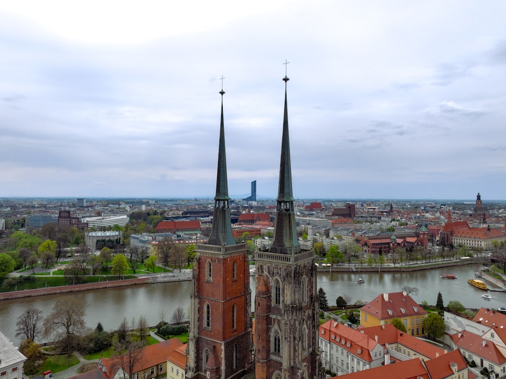 an aerial view of a city with a river in the background