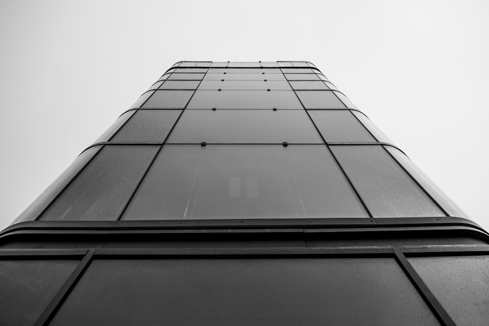 a black and white photo of a tall building