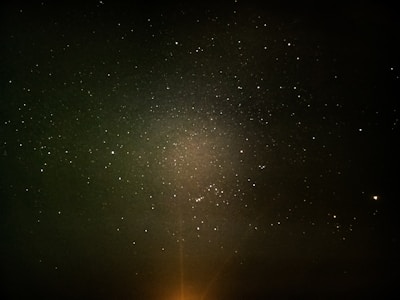 A cluster of bright stars forming a subtle outline of a clickable zone.