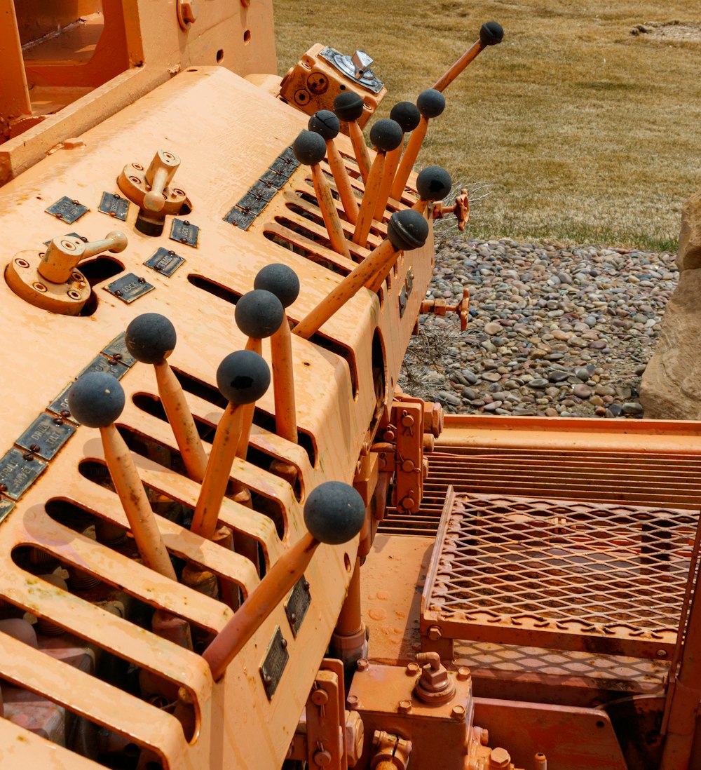 a row of wooden skis sitting on top of a field