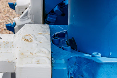 Close-up of machinery parts being cleaned with advanced chemical agents