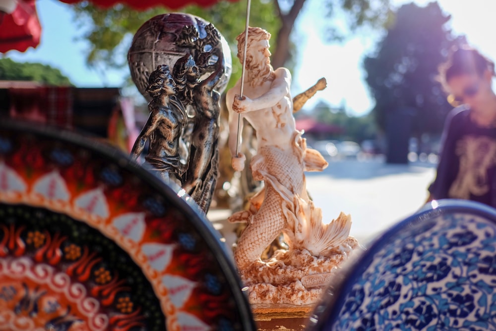 a close up of a figurine on a table