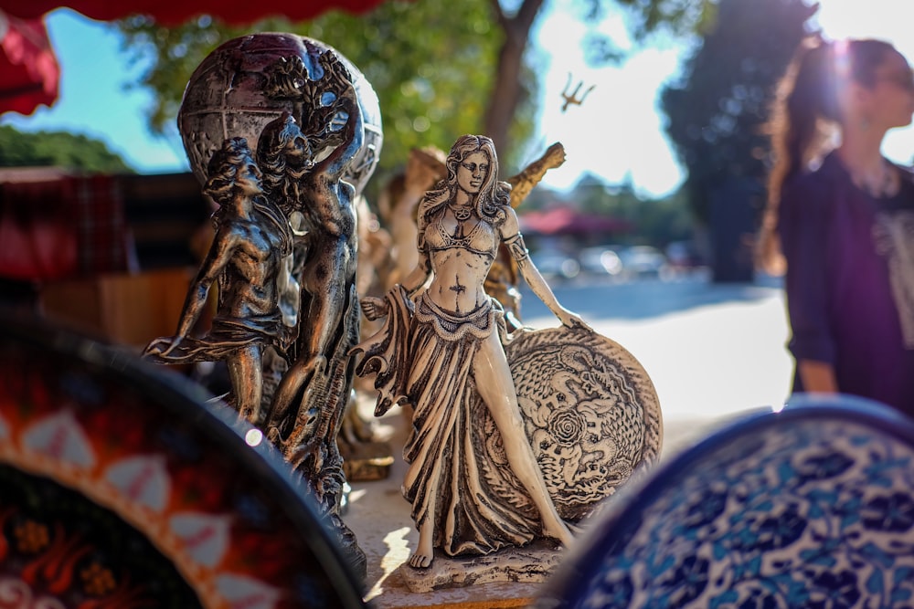 a close up of a figurine on a table