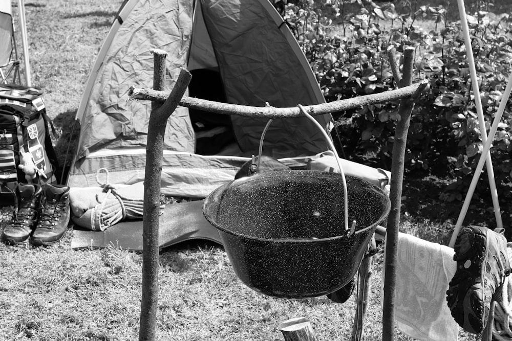 a black and white photo of a camping site