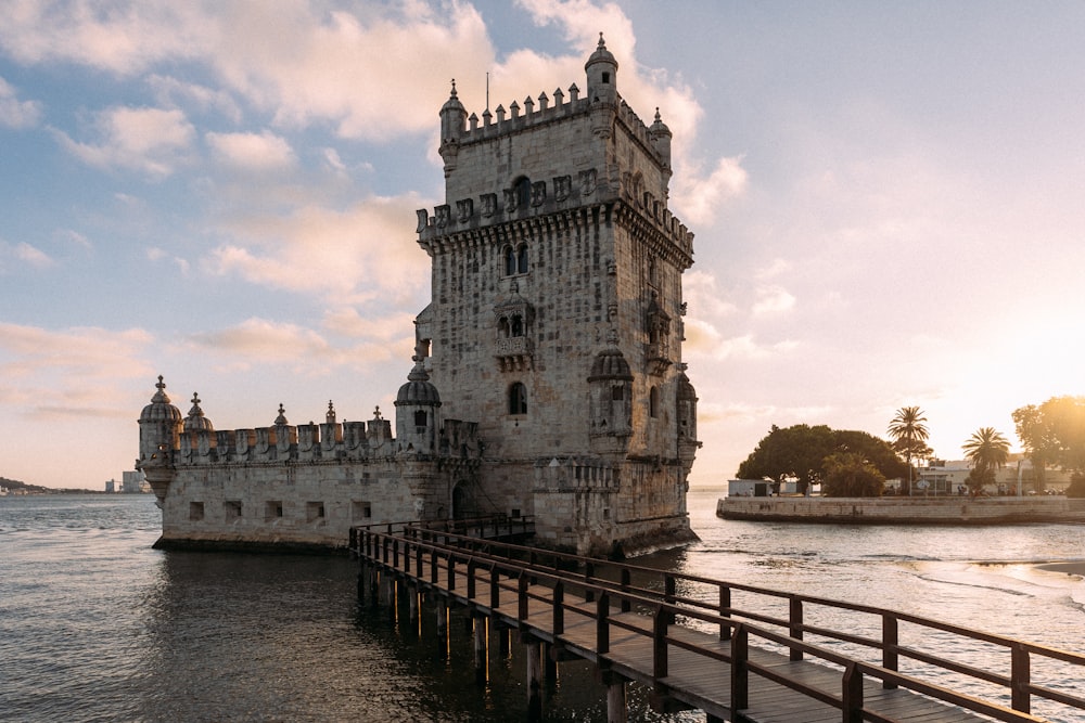 a large tower sitting on top of a body of water