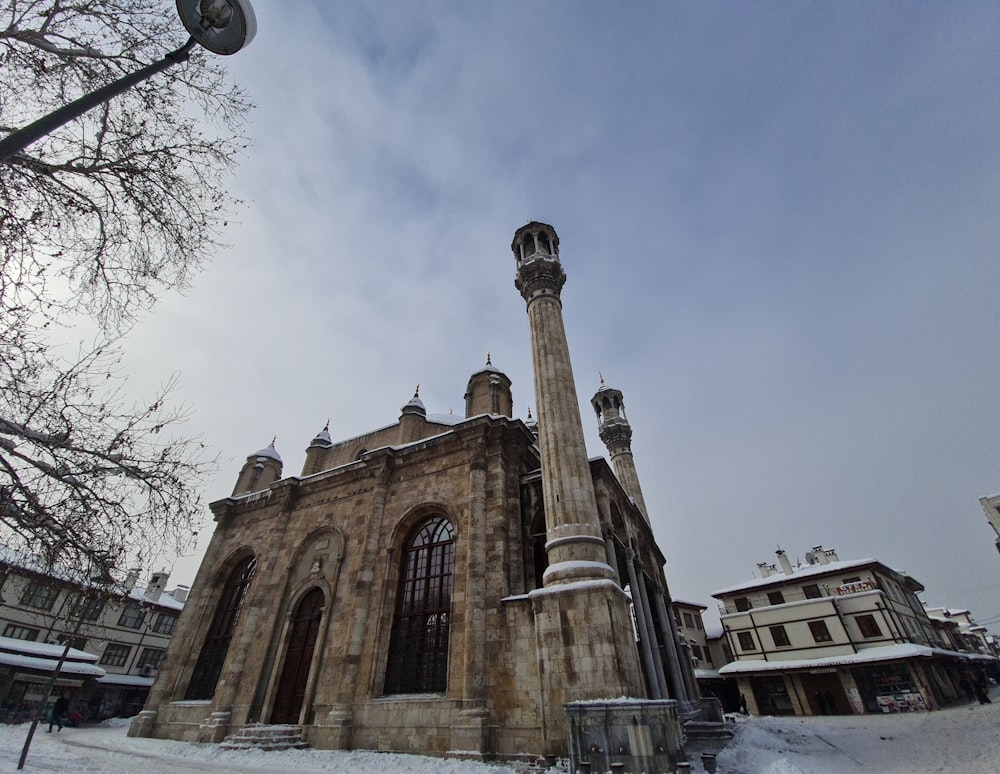 a large building with a clock tower in the middle of it