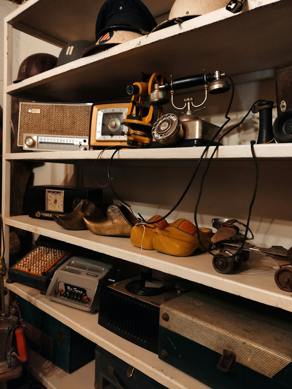 a shelf filled with lots of different types of items