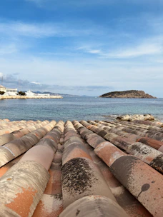 a view of a body of water from a roof