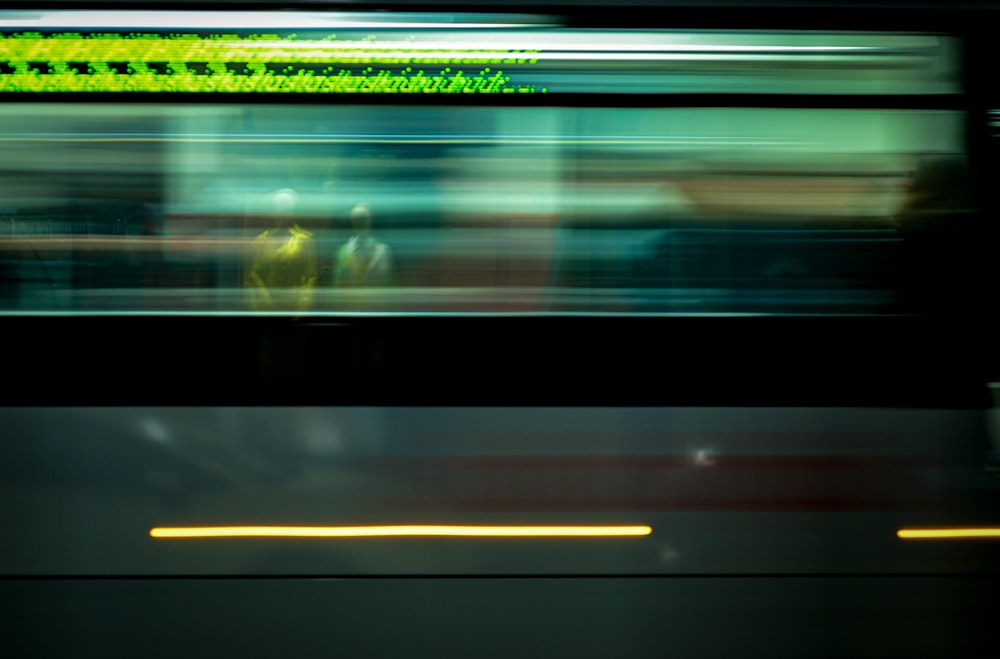 a blurry photo of a subway train