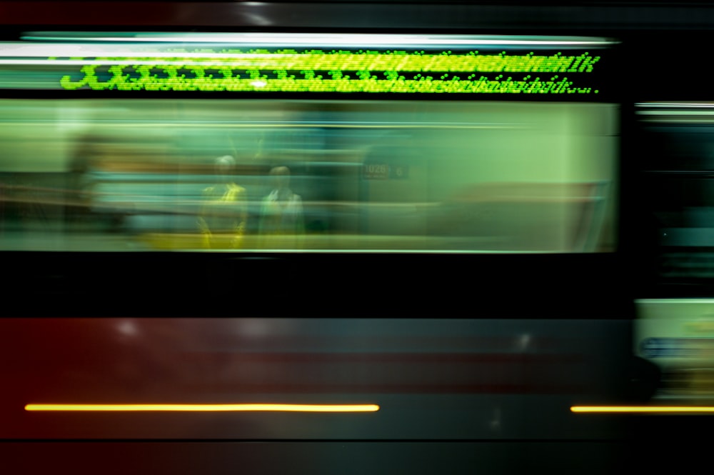 a blurry photo of a train passing by