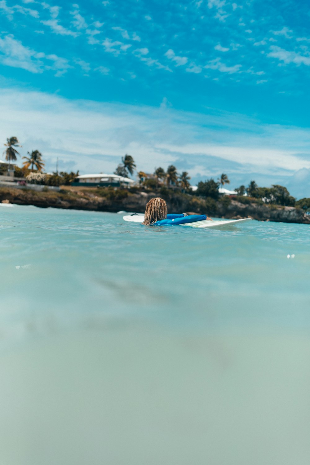 a person on a surfboard in the water