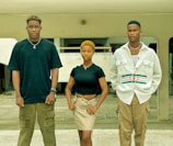 a group of people standing next to each other
