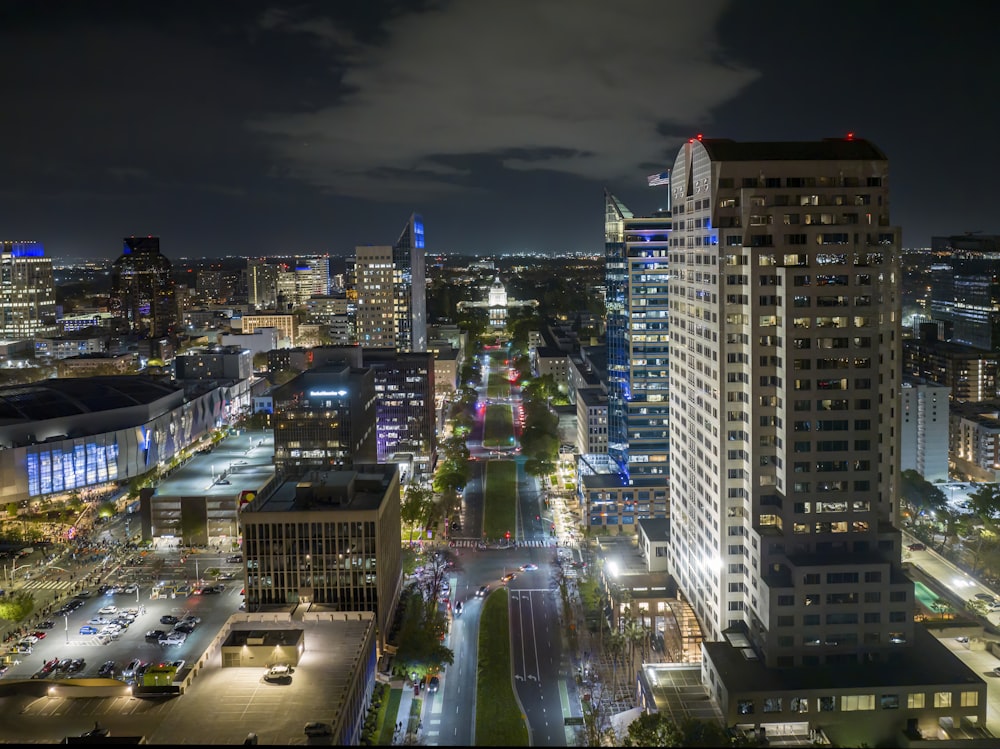 a view of a city at night from the top of a building