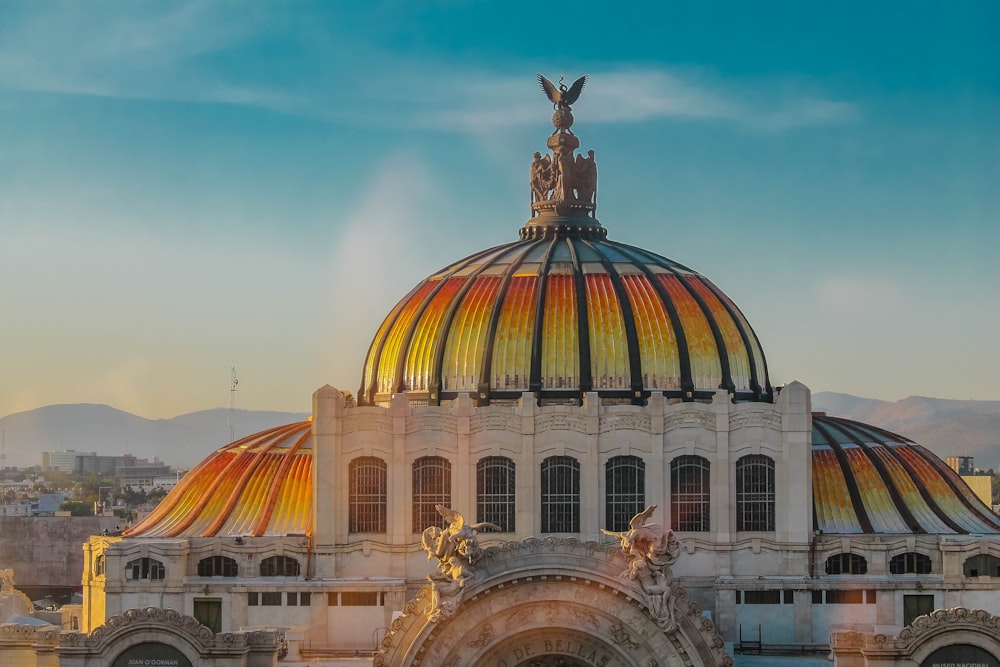 a large building with a colorful dome on top of it