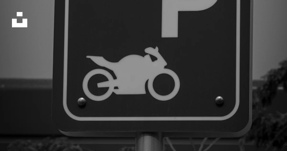 A Black And White Photo Of A Parking Sign Photo Free Image On Unsplash a-black-and-white-photo-of-a-parking-sign-photo-free-image-on-unsplash
