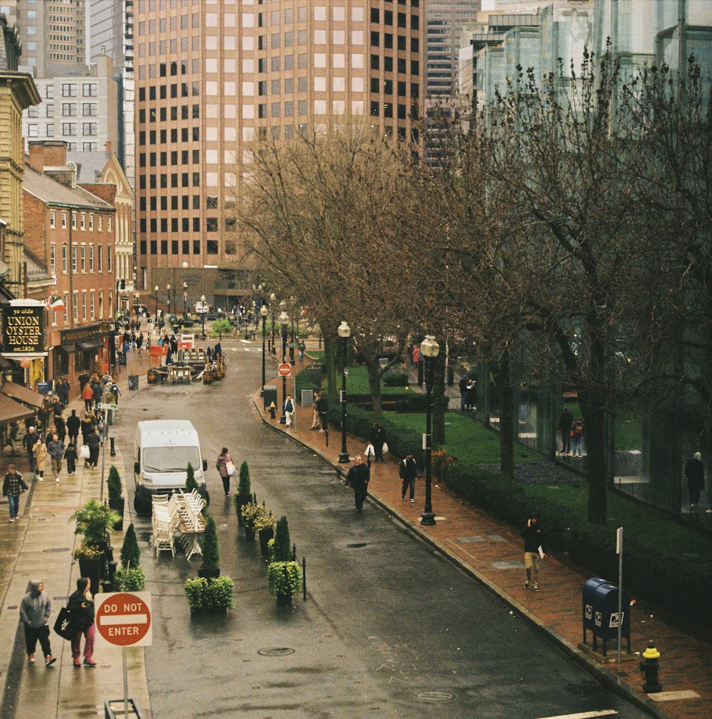 a city street filled with lots of tall buildings