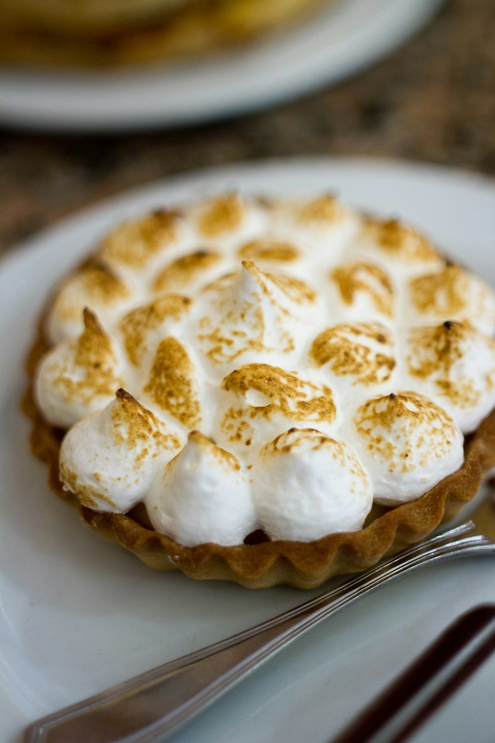 a dessert with whipped cream on top of it