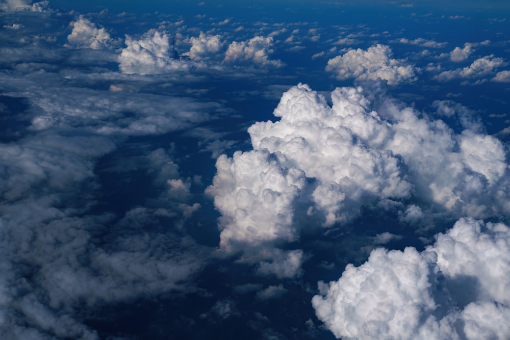 a view of the clouds from an airplane window