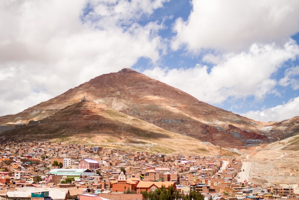 a city with a mountain in the background