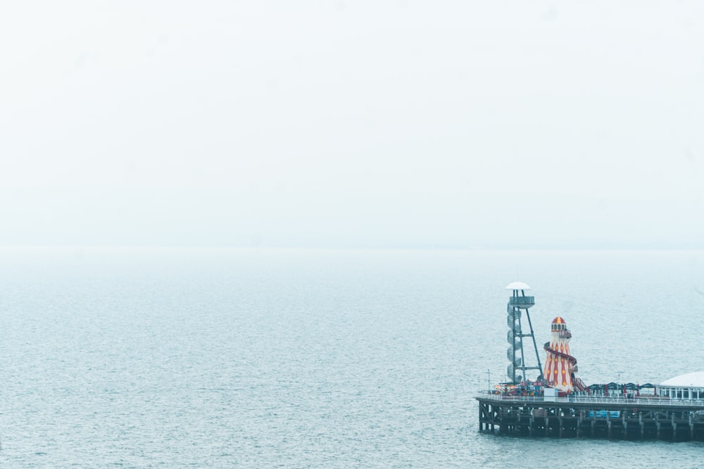 a pier in the middle of a large body of water