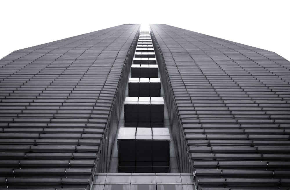 a black and white photo of a tall building