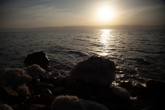 A serene view of the Sea of Galilee at sunset.
