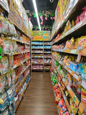 Close-up of colorful healthy snacks neatly arranged on shelves at vidaverde.