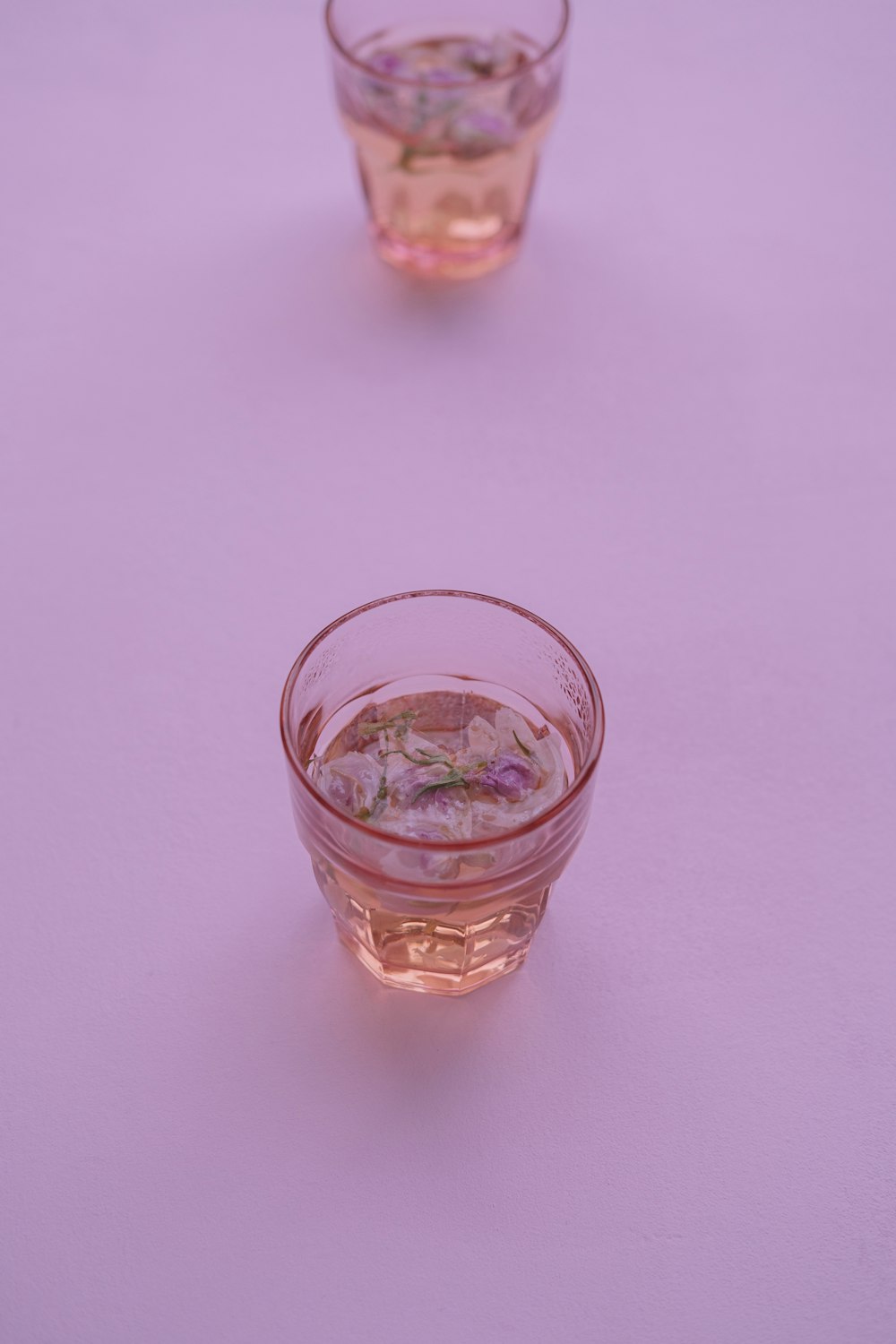 a couple of glasses sitting on top of a table