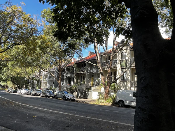 A welcoming Sydney neighborhood with charming houses and leafy streets in the inner west at sunset