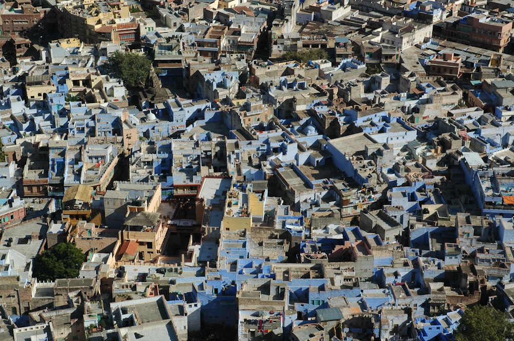 a large group of blue buildings in a city