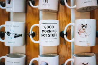 A colorful display of personalized mugs showcasing various designs.