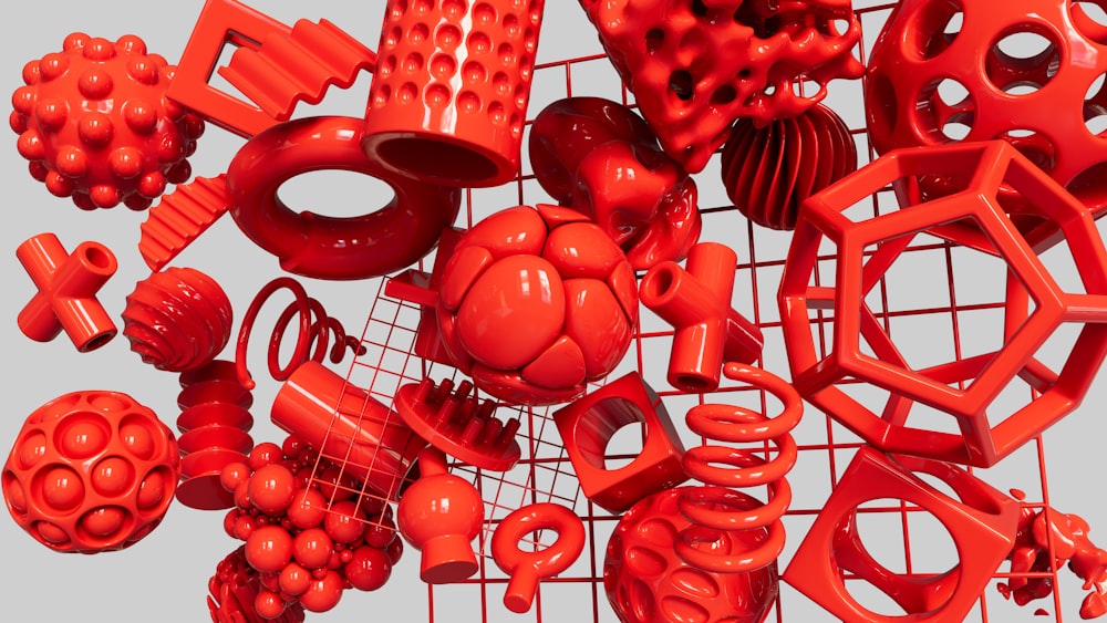 a bunch of red objects that are on a rack