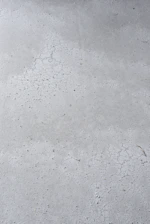Close-up of smooth, freshly poured concrete surface ready for construction.