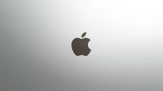 A simple, clean logo centered on a white background with a subtle shadow.