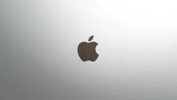 A simple, clean logo centered on a white background with a subtle shadow.