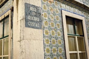 Traditional Portuguese tiles adorning a building.
