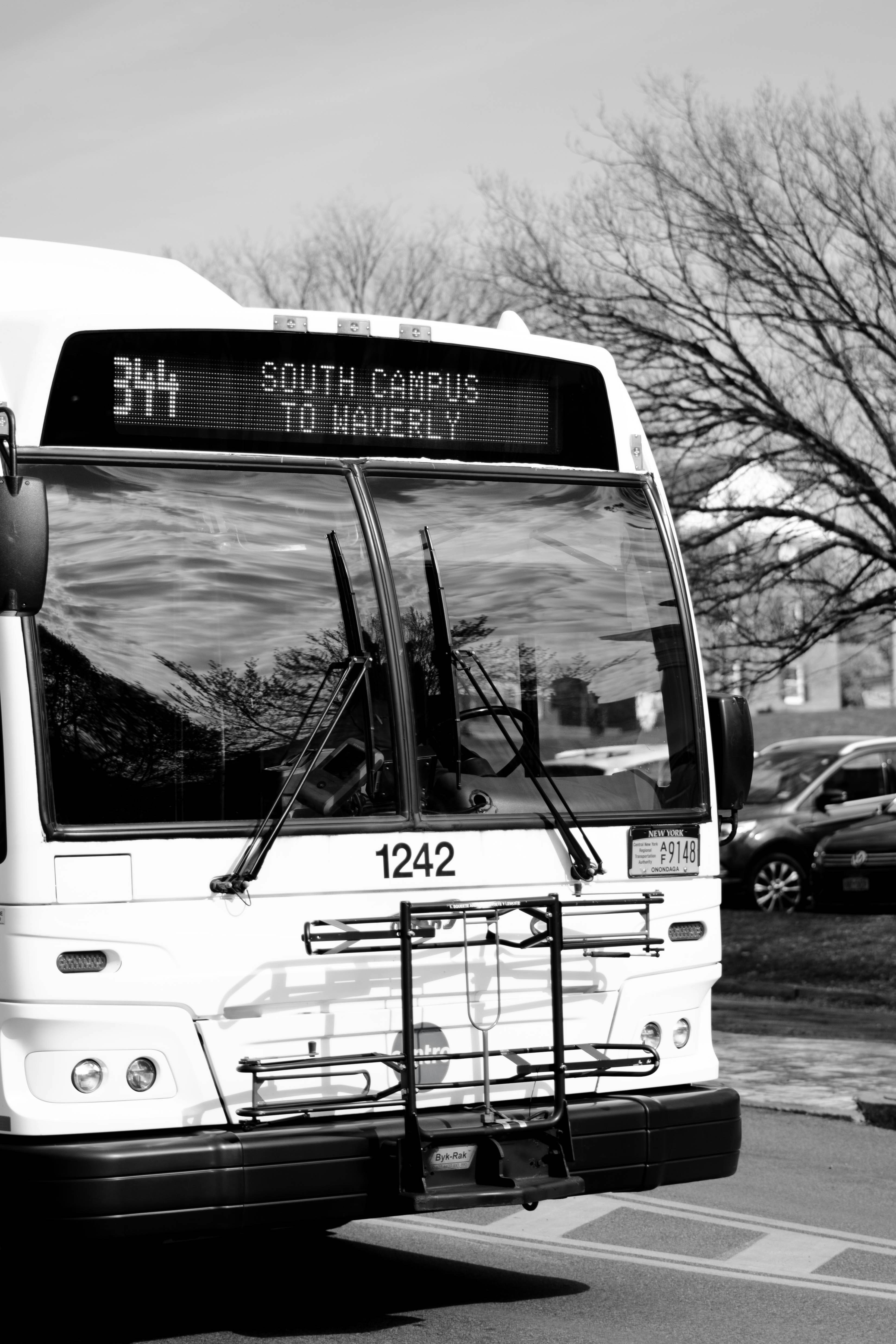 a black and white photo of a bus