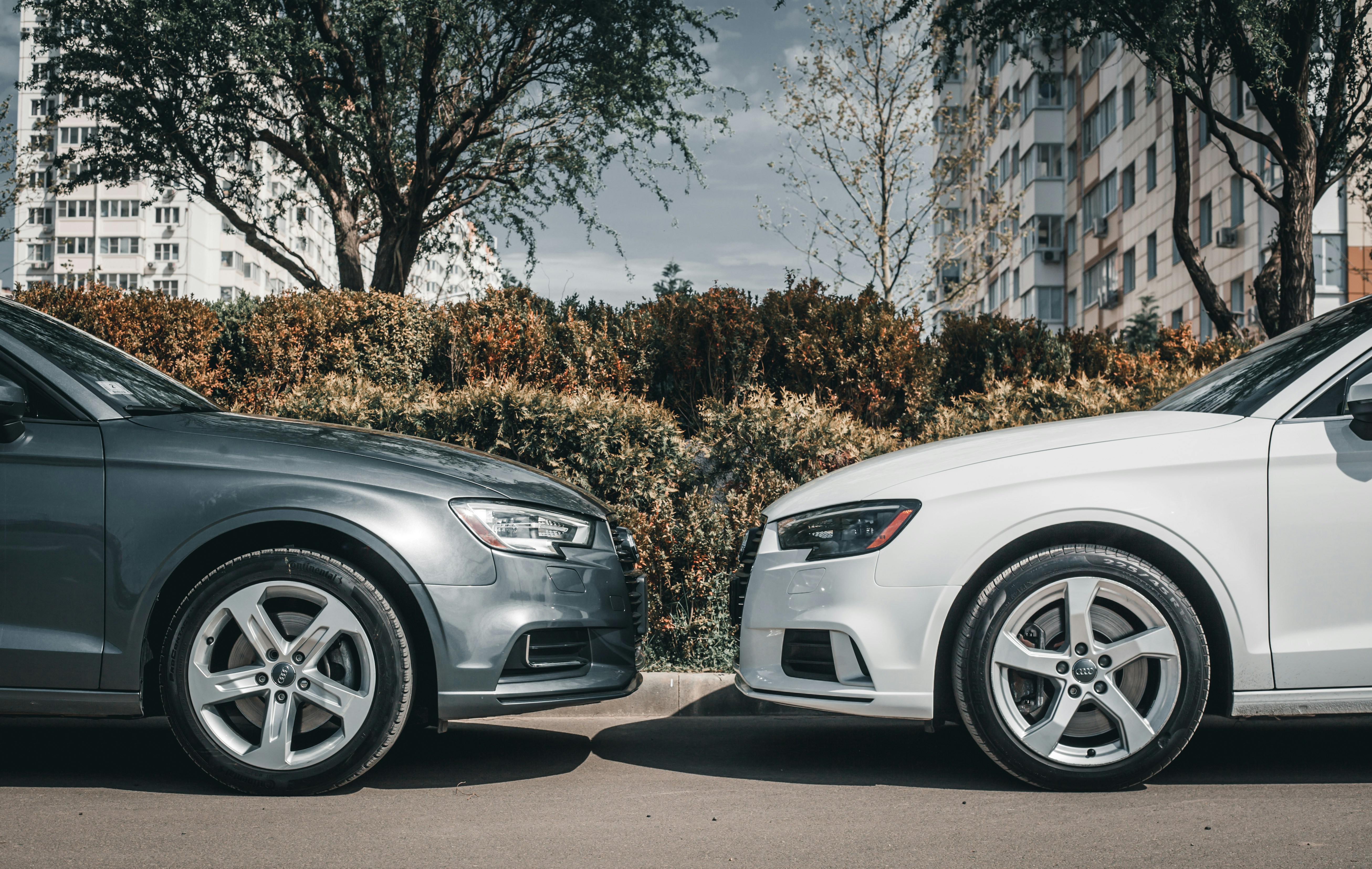 a couple of cars parked next to each other