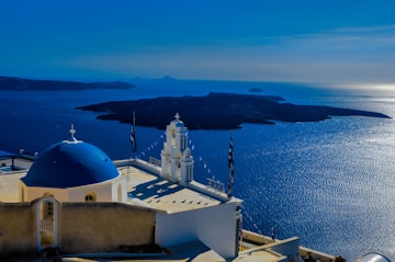 a church with a blue dome on top of a building