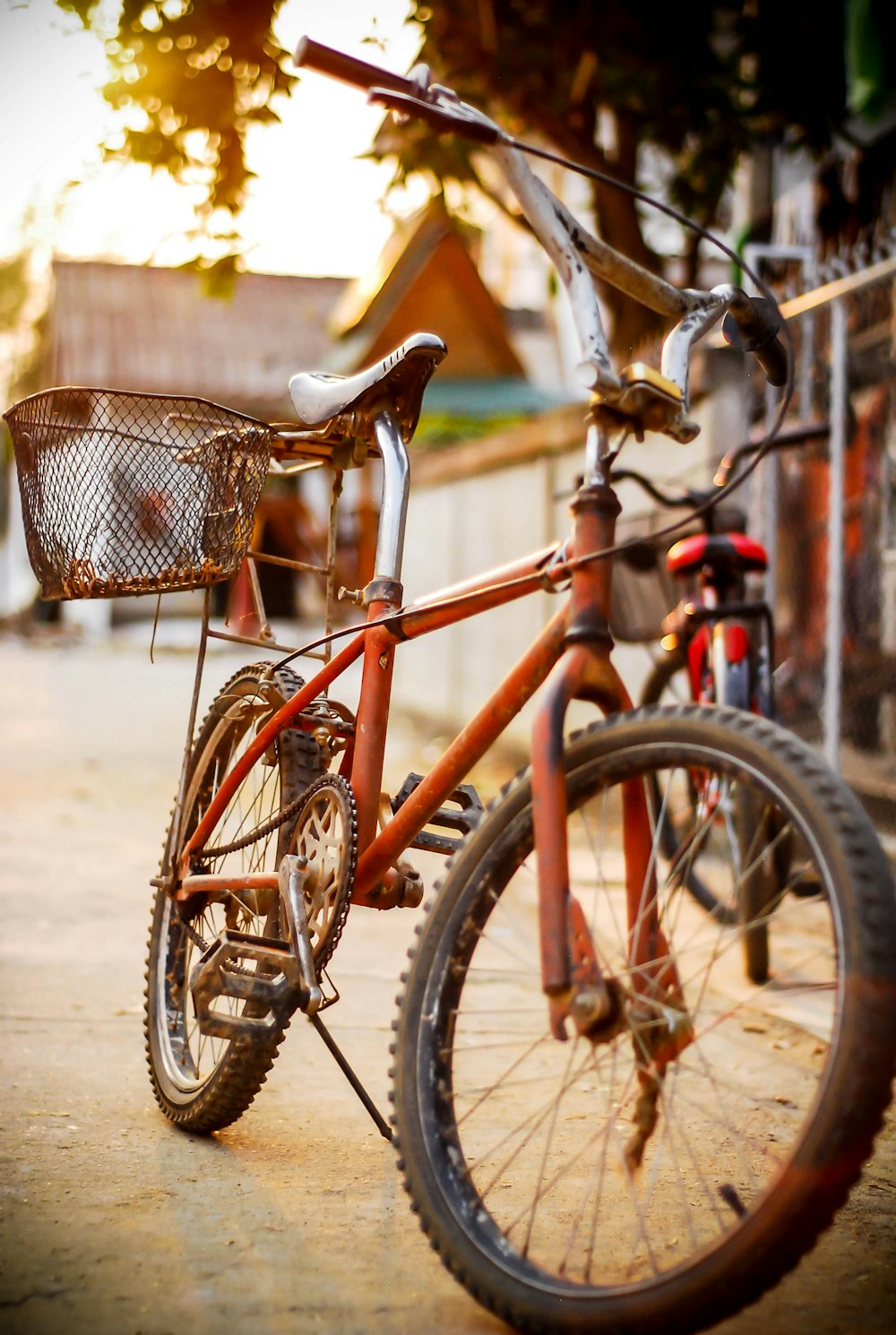 a bicycle parked on the side of the road