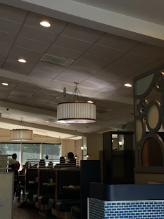 Cozy interior of Hearthside Diner with wooden booths and soft lighting