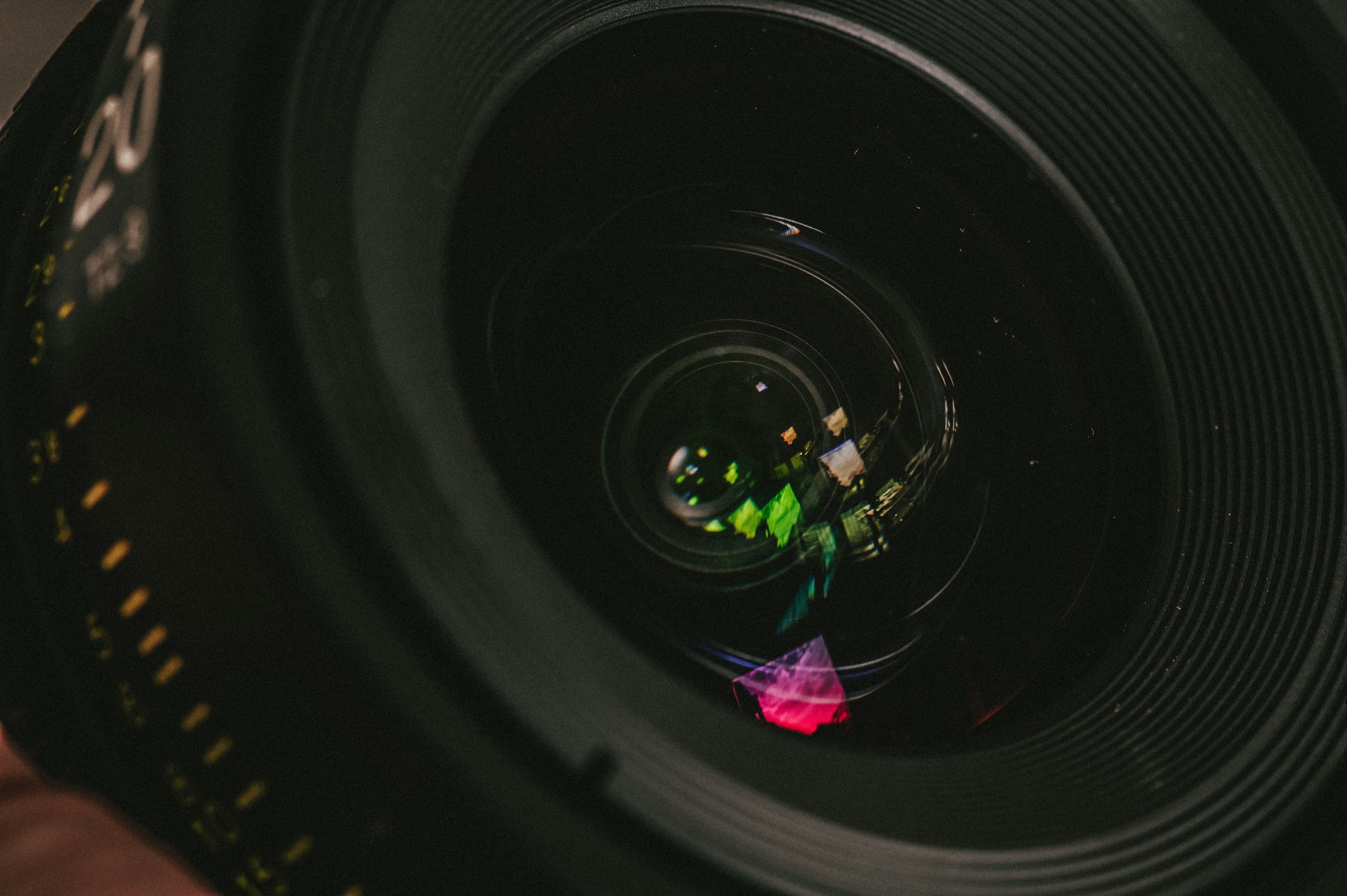 Photographer reviewing images on monitor with color wheel and scopes