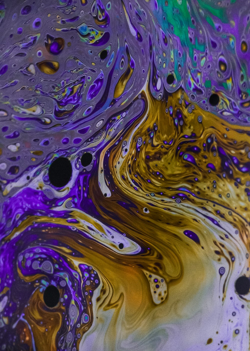a close up view of a liquid painting